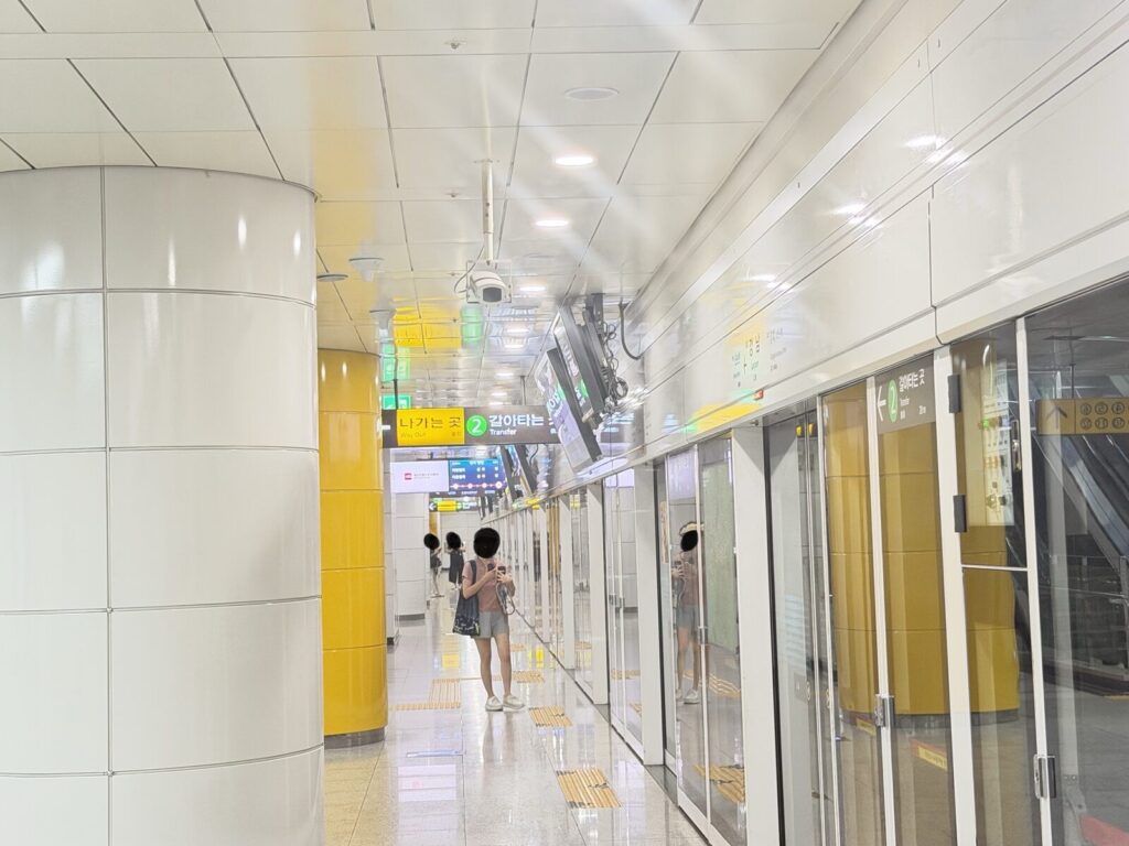 Underground corridor with Way Out and Transfer to Line 2 signage near Gangnam Station